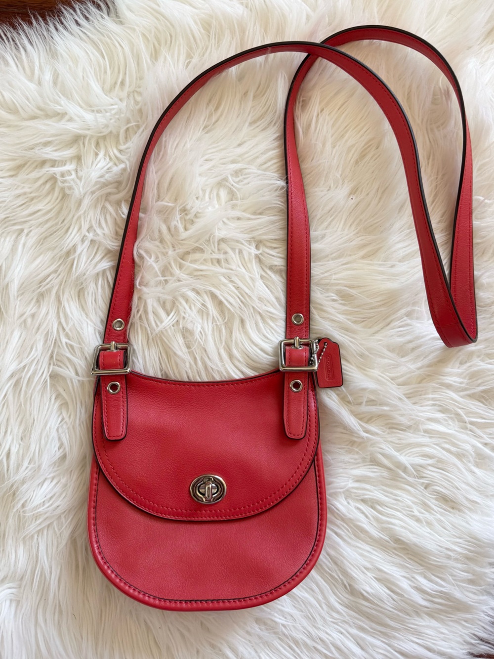 NWOT COACH Legacy Mini Saddle Bag in ‘Coral Red’ with silver hardware